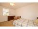 Comfortable bedroom showcasing natural light, warm tones and ample space at 4130 N Quail Dr, Douglasville, GA 30135