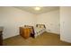 Comfortable bedroom showcasing natural light, warm tones and ample space at 4130 N Quail Dr, Douglasville, GA 30135