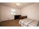 Comfortable bedroom showcasing natural light, warm tones and ample space at 4130 N Quail Dr, Douglasville, GA 30135