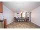 Bright dining room featuring a table set for six, neutral walls, tile floors, and natural light at 4130 N Quail Dr, Douglasville, GA 30135