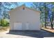 Exterior garage with driveway at 4130 N Quail Dr, Douglasville, GA 30135