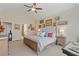 Inviting main bedroom with vaulted ceiling and decorative wall art at 5977 Wildcreek Rd, Sugar Hill, GA 30518
