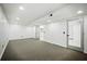 Finished basement with carpet, recessed lighting, and open layout, perfect for entertaining and Gathering fun at 681 Fielding Sw Ln, Atlanta, GA 30311