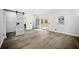 Spacious bedroom with french doors, walk-in closet, and light-colored tile flooring at 681 Fielding Sw Ln, Atlanta, GA 30311