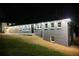 Charming exterior of a renovated home with well-lit surroundings at night at 681 Fielding Sw Ln, Atlanta, GA 30311