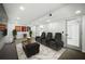 Finished basement designed as a home theater, complete with leather recliners and entertainment center at 681 Fielding Sw Ln, Atlanta, GA 30311
