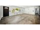 Spacious, bright living room features large windows and modern flooring, ready for your personal design at 681 Fielding Sw Ln, Atlanta, GA 30311