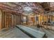 Spacious unfinished basement with exposed ceiling and visible stud framing at 119 Creekside Vw, Hiram, GA 30141