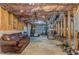 Unfinished basement featuring exposed ceiling, concrete floor, and potential workout area at 119 Creekside Vw, Hiram, GA 30141