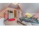 Bright bedroom featuring a pink rug, toys and storage at 119 Creekside Vw, Hiram, GA 30141