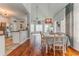 Charming dining area with hardwood floors and a chandelier at 119 Creekside Vw, Hiram, GA 30141