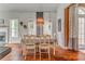Dining room features a charming table setting and attractive lighting at 119 Creekside Vw, Hiram, GA 30141