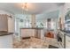 Open kitchen featuring stainless steel appliances and access to the dining area at 119 Creekside Vw, Hiram, GA 30141