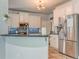 Well-equipped kitchen featuring stainless steel appliances and ample countertop space at 119 Creekside Vw, Hiram, GA 30141