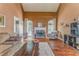 Spacious living room features hardwood floors, stone fireplace and an abundance of natural light at 119 Creekside Vw, Hiram, GA 30141