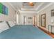 Well-lit and spacious main bedroom with hardwood floors, tray ceiling, and access to ensuite bathroom at 119 Creekside Vw, Hiram, GA 30141