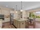 Beautiful kitchen with eat-in area features granite countertops and stainless steel appliances at 2564 Lulworth Ne Ln, Marietta, GA 30062