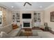 Cozy living room features built-in shelving, a fireplace, and comfortable seating at 2564 Lulworth Ne Ln, Marietta, GA 30062