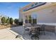 Outdoor patio provides a private dining area with a table and chairs, complemented by a brick-accented wall at 2564 Lulworth Ne Ln, Marietta, GA 30062