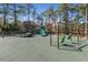 Fun playground equipment featuring slides and swings on a safety-surfaced play area at 2564 Lulworth Ne Ln, Marietta, GA 30062