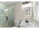 Updated bathroom featuring a glass shower, tile, and modern fixtures at 3524 Brookfield Ln, Decatur, GA 30032
