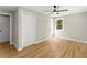 Bedroom with a closet, window, and hardwood floors at 3524 Brookfield Ln, Decatur, GA 30032