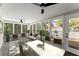 Bright sunroom with large windows, comfortable seating, and access to the backyard at 3524 Brookfield Ln, Decatur, GA 30032