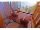 Full pink tiled bathroom with pink toilet and pink sink at 3528 Highway 42 S, Locust Grove, GA 30248
