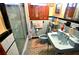 Bright blue tiled bathroom with blue toilet and blue sink at 3528 Highway 42 S, Locust Grove, GA 30248