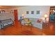Inviting living room featuring hardwood floors, decorative fireplace, and comfortable seating at 3528 Highway 42 S, Locust Grove, GA 30248
