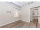 Basement bedroom featuring plank flooring, a modern window, and neutral wall colors at 1019 Walnut Creek Dr, Woodstock, GA 30188