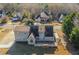 Two-story home featuring a well-kept backyard with a deck and mature trees at 1019 Walnut Creek Dr, Woodstock, GA 30188