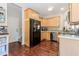 Spacious kitchen with stainless steel appliances, ample cabinet space, and hardwood floors, great for cooking at 1019 Walnut Creek Dr, Woodstock, GA 30188
