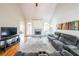 Spacious living room with vaulted ceilings, fireplace, and hardwood floors at 103 Gold Springs Ct, Canton, GA 30114