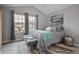 Bedroom with large windows, gray walls, and patterned rug at 21 Samuel Nw Way, Cartersville, GA 30121