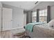 Vaulted bedroom with large windows and luxury linens at 21 Samuel Nw Way, Cartersville, GA 30121