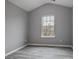 Bedroom with a neutral palette, vaulted ceiling and one window at 21 Samuel Nw Way, Cartersville, GA 30121