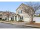 Charming two-story home featuring a quaint front porch and attached one-car garage at 21 Samuel Nw Way, Cartersville, GA 30121