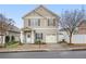 Charming two-story home with neutral siding, shutters, a well-manicured front yard, and a one-car garage at 21 Samuel Nw Way, Cartersville, GA 30121