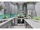 Modern kitchen with sleek countertops, stainless steel appliances, and gray cabinets at 21 Samuel Nw Way, Cartersville, GA 30121