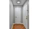 Traditional entryway with white doors, hardwood floors, and neutral paint at 5159 Roswell Rd # 7, Sandy Springs, GA 30342