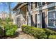 Inviting condo featuring traditional architecture and manicured landscaping at 5159 Roswell Rd # 7, Sandy Springs, GA 30342
