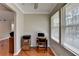 Cozy office space featuring hardwood floors, natural light from the window, and a compact desk setup at 5159 Roswell Rd # 7, Sandy Springs, GA 30342