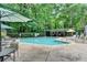 Community pool with lounge seating and a covered gazebo area at 5159 Roswell Rd # 7, Sandy Springs, GA 30342