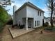 Spacious backyard with a stone patio and an outdoor seating area perfect for relaxing at 2158 Berryhill Se Cir, Smyrna, GA 30082