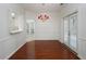Bright dining room features hardwood floors and a stylish chandelier at 2158 Berryhill Se Cir, Smyrna, GA 30082