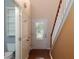 Bright entryway with decorative glass door, hardwood floors, and staircase at 2158 Berryhill Se Cir, Smyrna, GA 30082