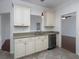 Well-lit kitchen featuring stainless steel appliances and ample cabinet space for storage at 2158 Berryhill Se Cir, Smyrna, GA 30082