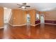 Open-concept living room with hardwood floors and dining area in view at 2158 Berryhill Se Cir, Smyrna, GA 30082