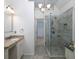 Contemporary main bathroom features a glass enclosed shower, granite countertop and tile flooring at 2158 Berryhill Se Cir, Smyrna, GA 30082
